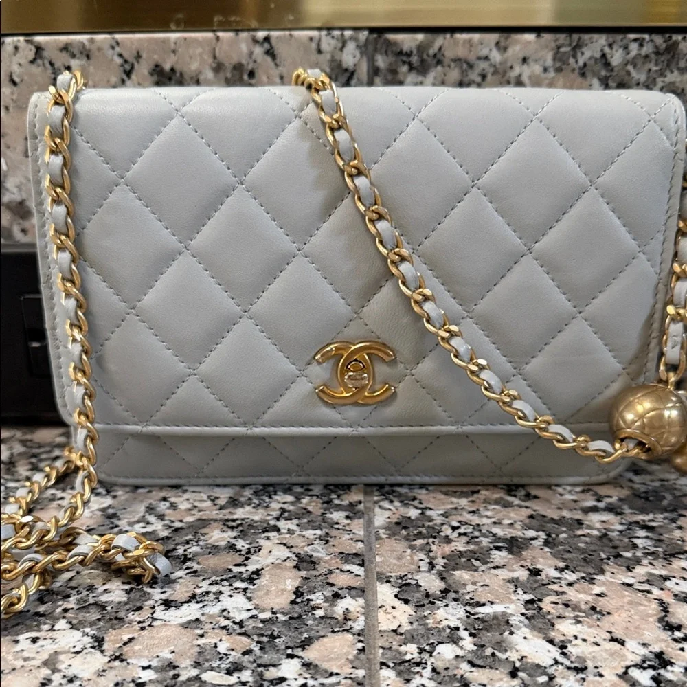 Chanel Light Blue Quilted Crossbody Bag with Gold Accents - Picture 2 of 6